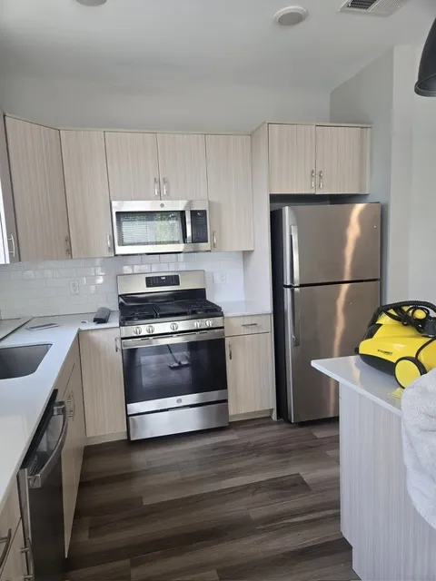 Airbnb kitchen reset by a cleaning crew in New Jersey
